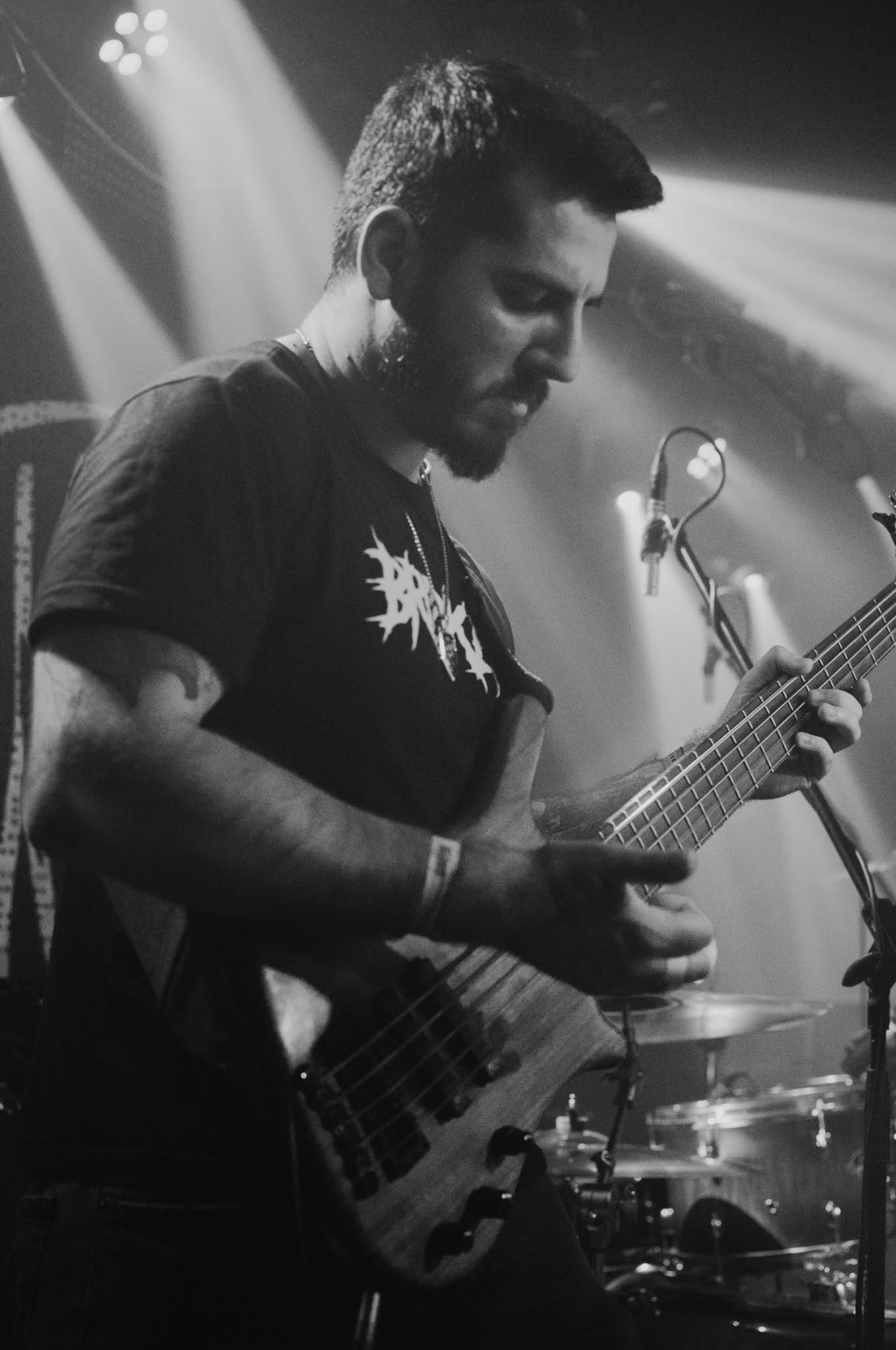 Kristiyan playing bass on stage